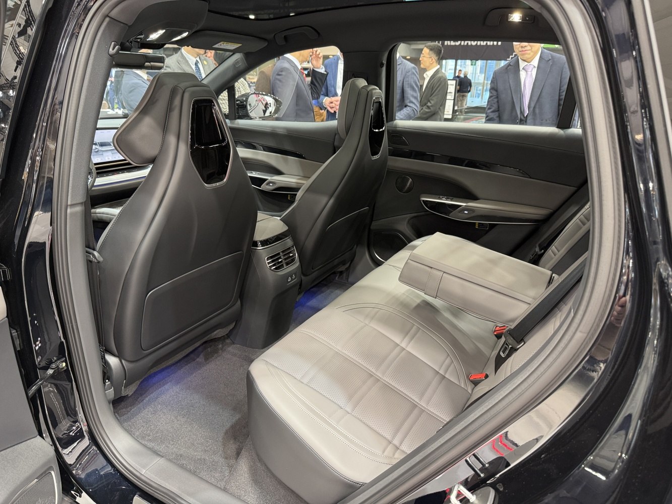 Spacious premium leather rear seating with advanced comfort features