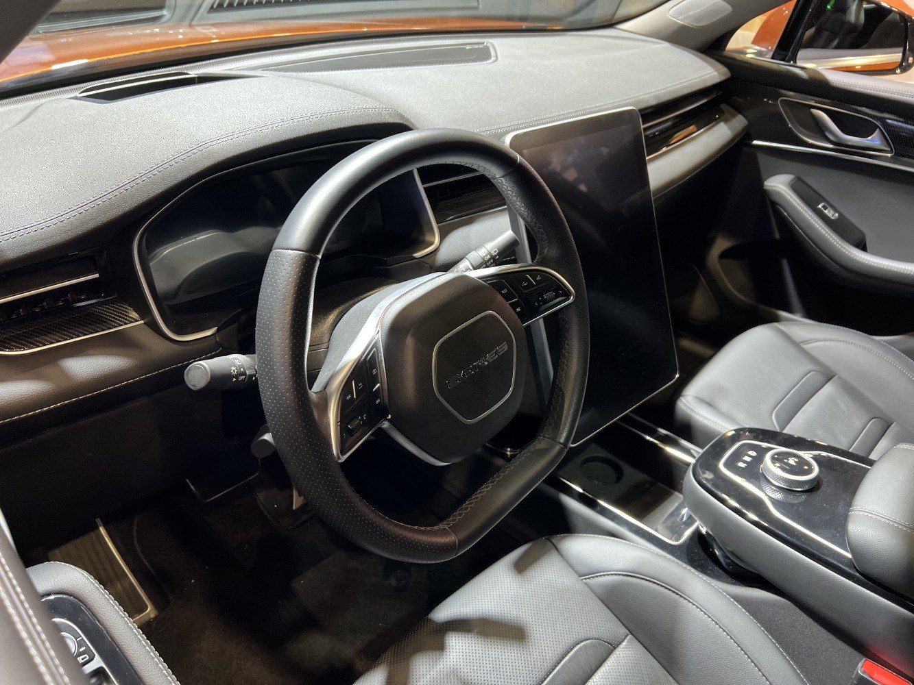 Multifunction steering wheel and large touchscreen on modern dashboard