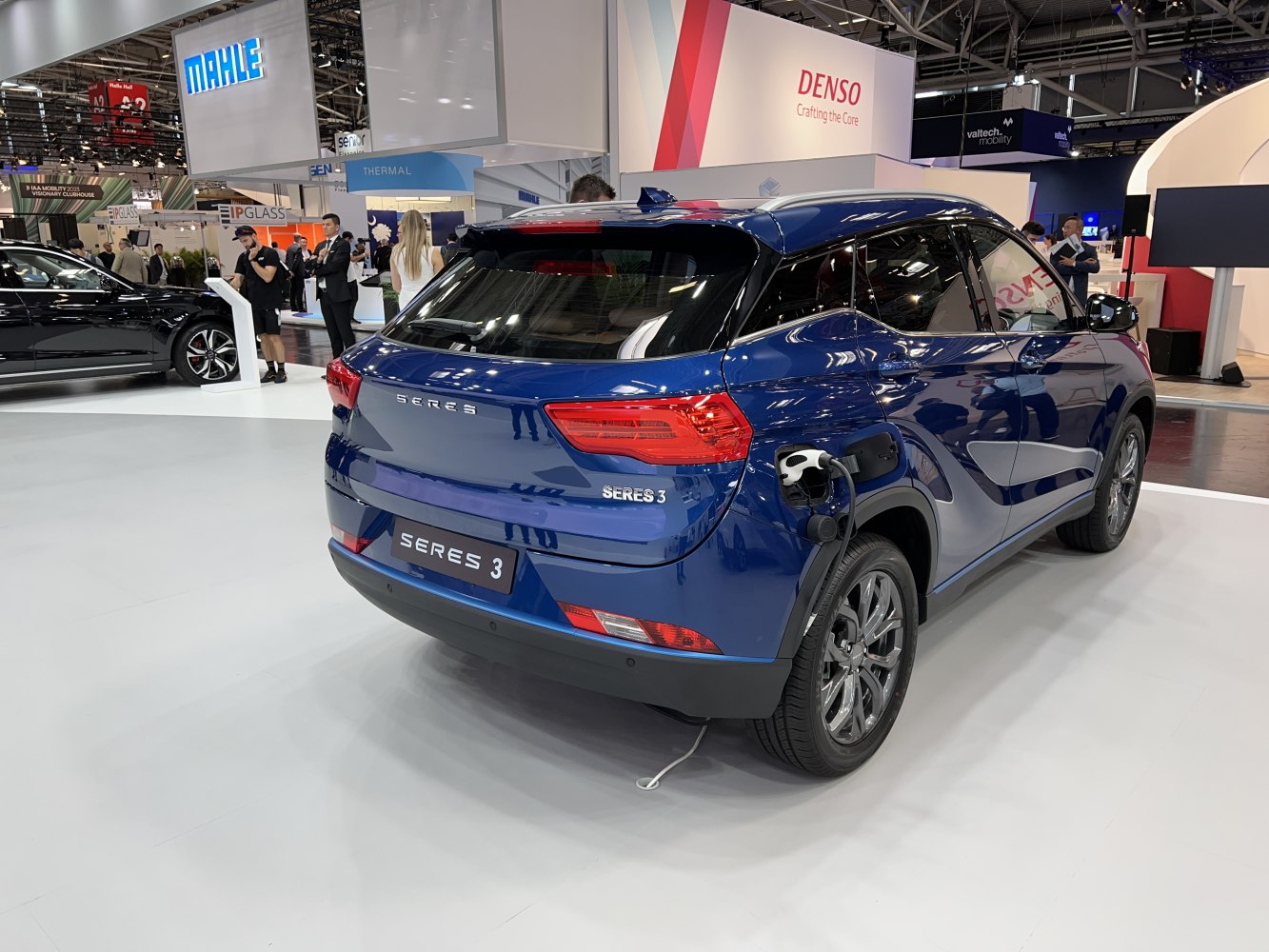 Electric SUV rear with charging cable and modern tail lights