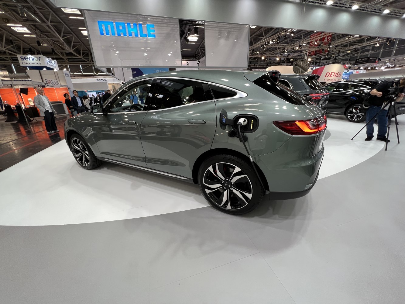 Electric SUV side view with charging port and modern design
