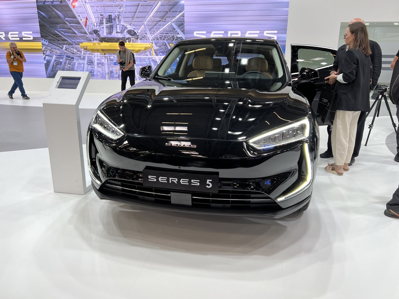 Front view of a vehicle with sharp LED headlights and aerodynamic bumper