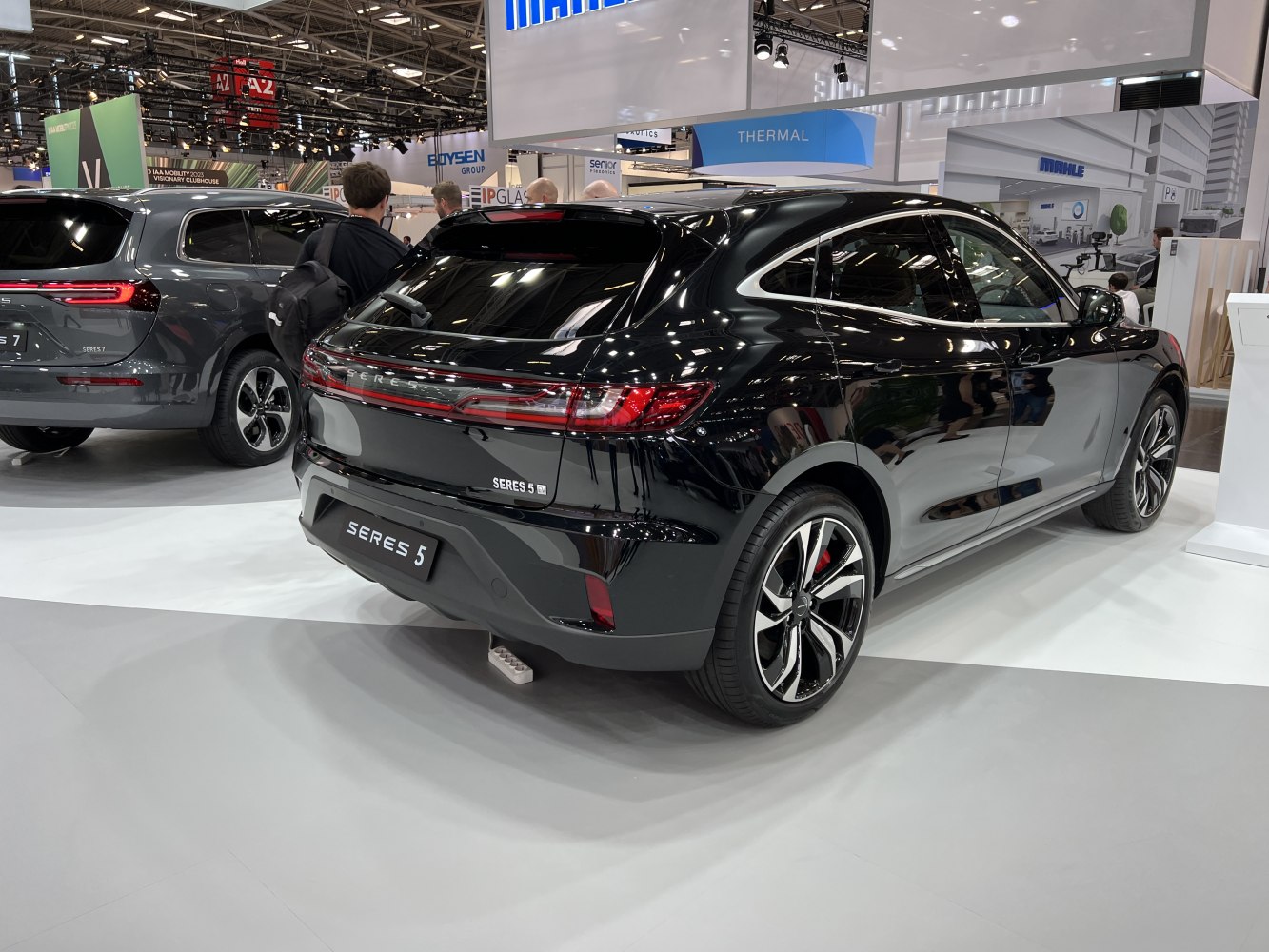 Rear view of electric SUV with LED taillights and sporty alloy wheels