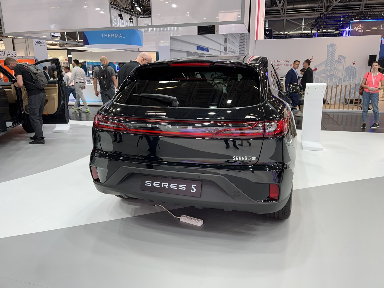 Rear view with full-width LED taillights and aerodynamic design.