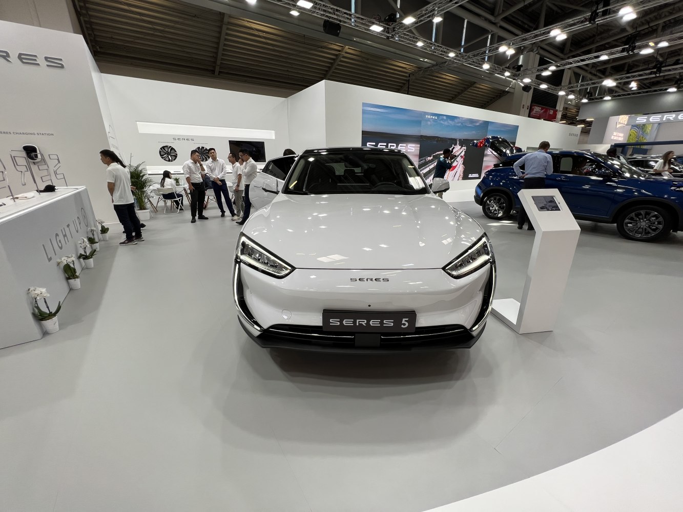 Front view of an electric SUV with LED headlights and sleek design.