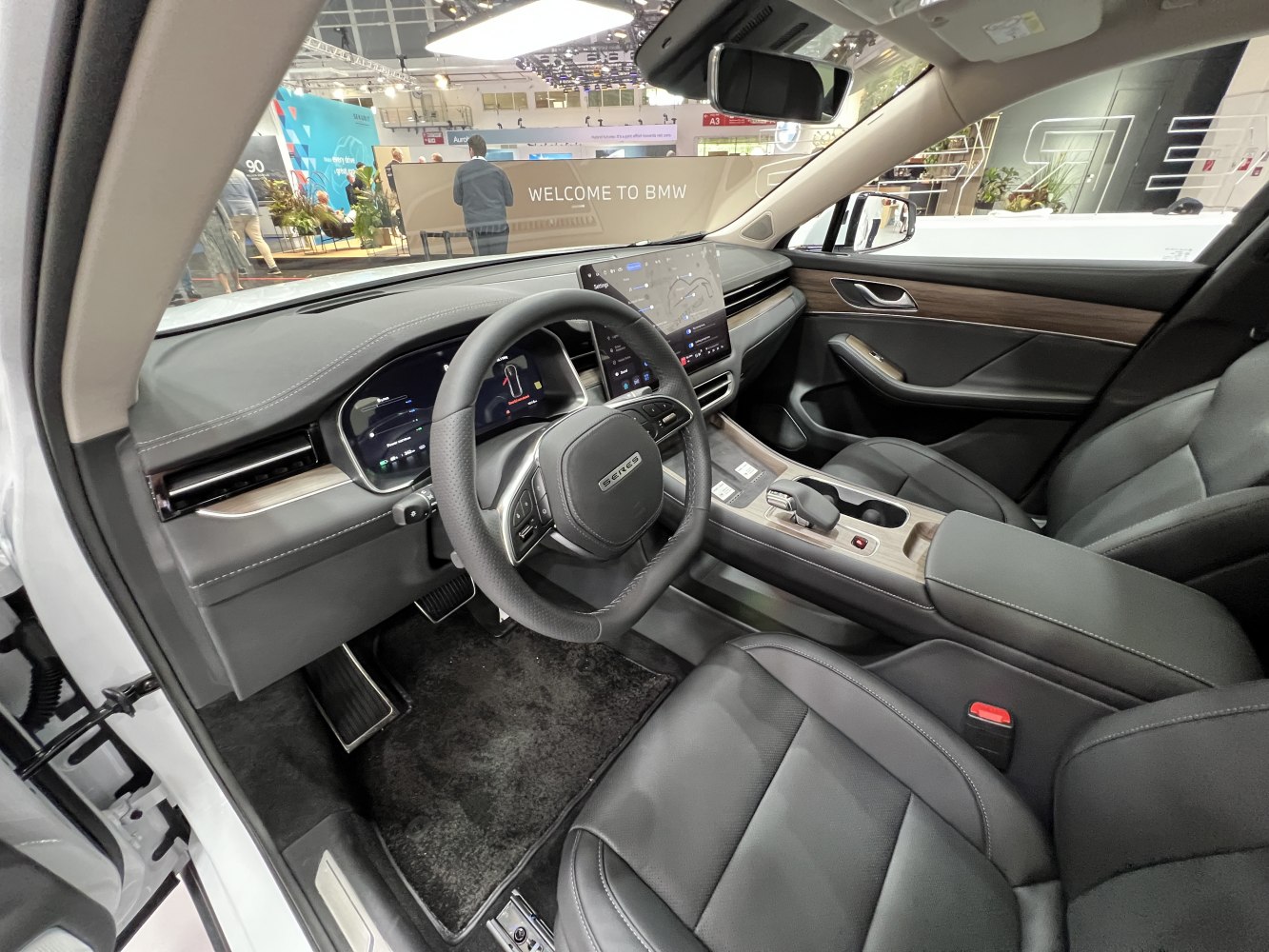 Digital instrument cluster and touchscreen dashboard with leather seats interior