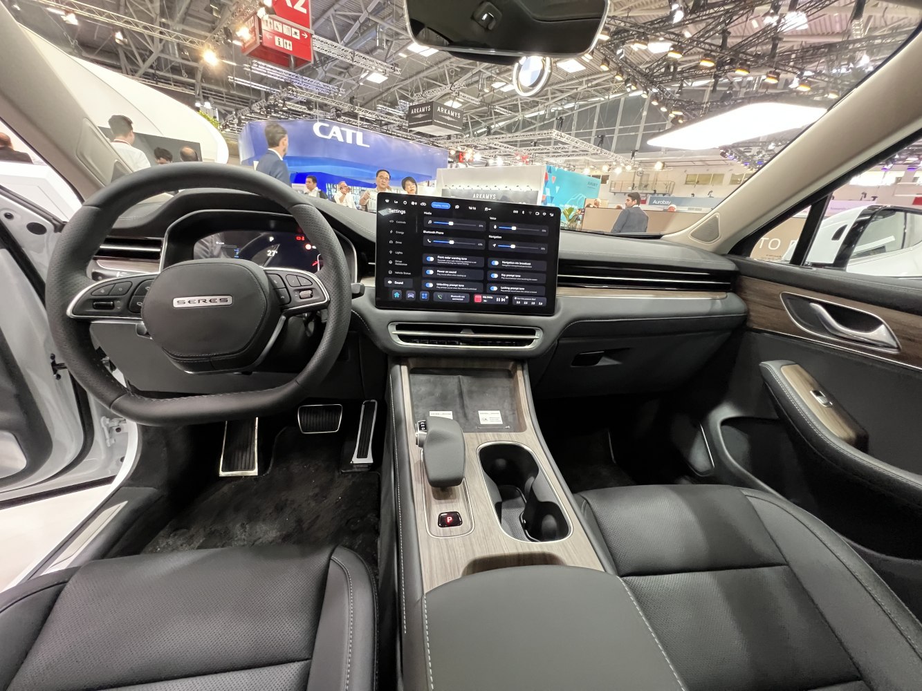 Digital instrument cluster and large infotainment touchscreen in a modern interior