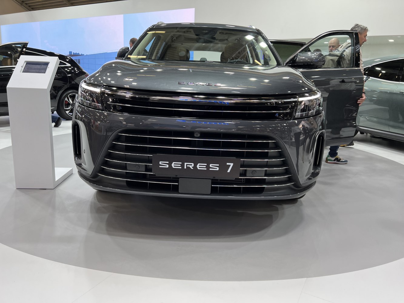 Front view with LED headlights and wide horizontal grille