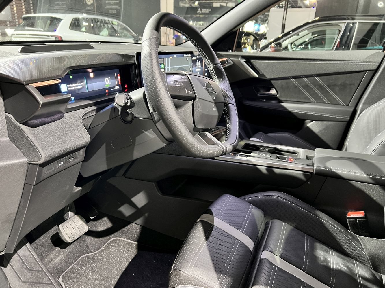 Digital dashboard and multifunction steering wheel in modern car interior