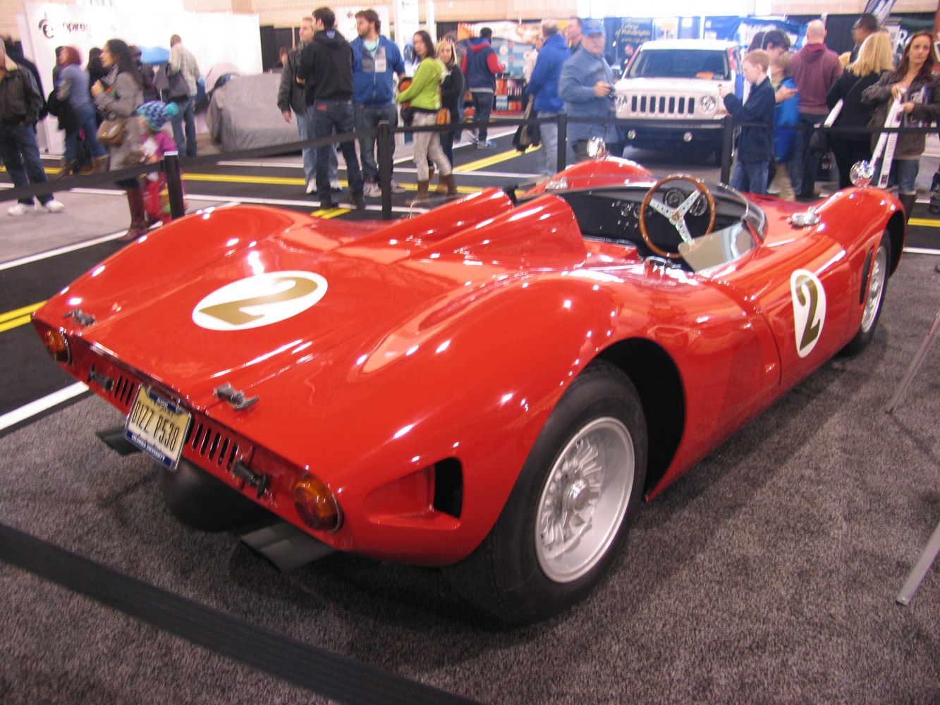 Sleek aerodynamic curves and open cockpit of a vintage race car