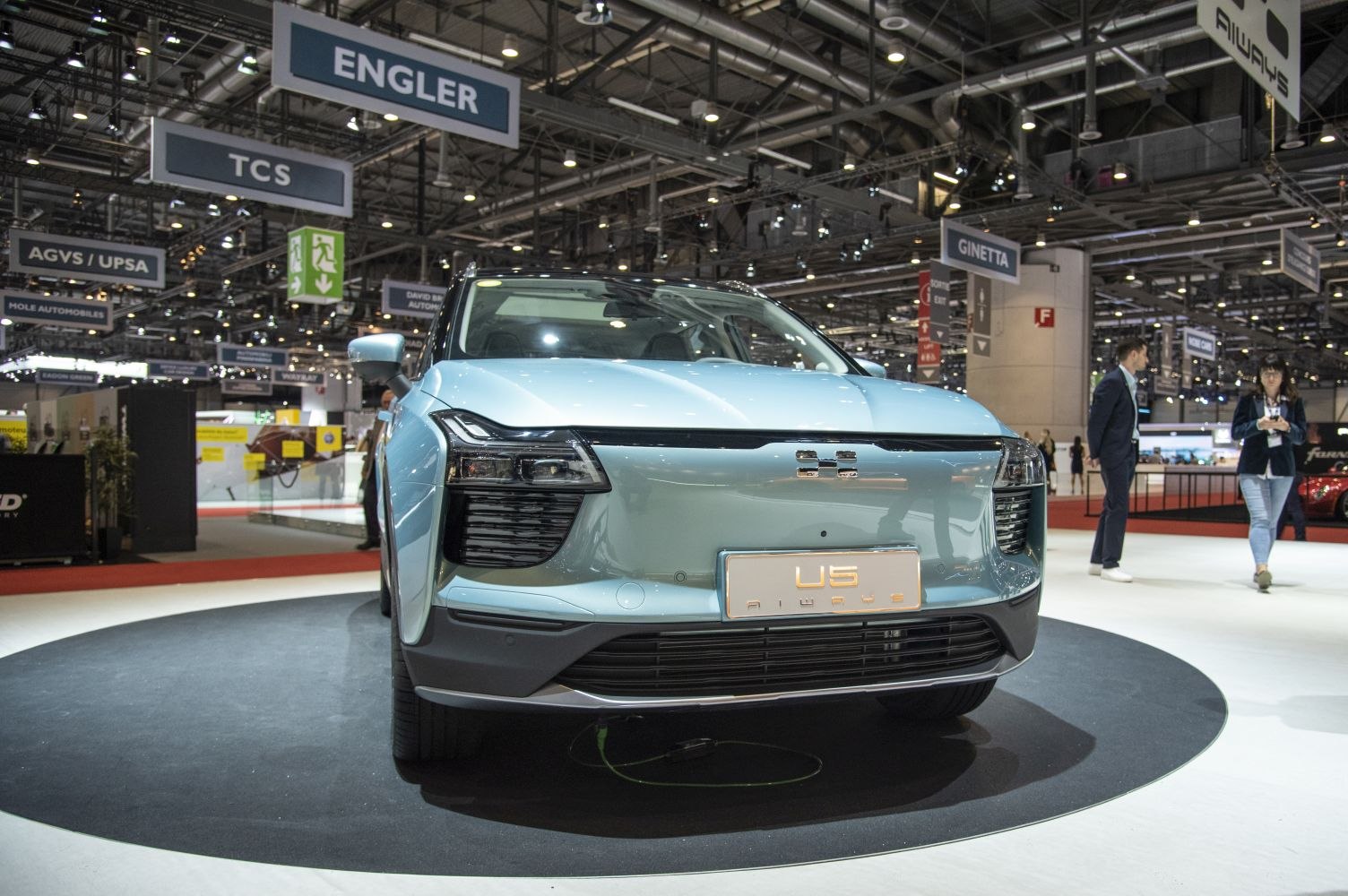 Front view of electric SUV with modern headlights and grille