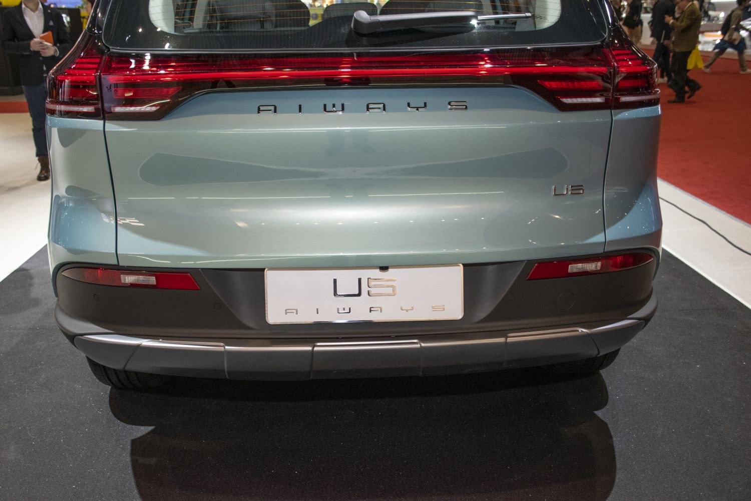 Rear view with distinct tail lights and rear design features