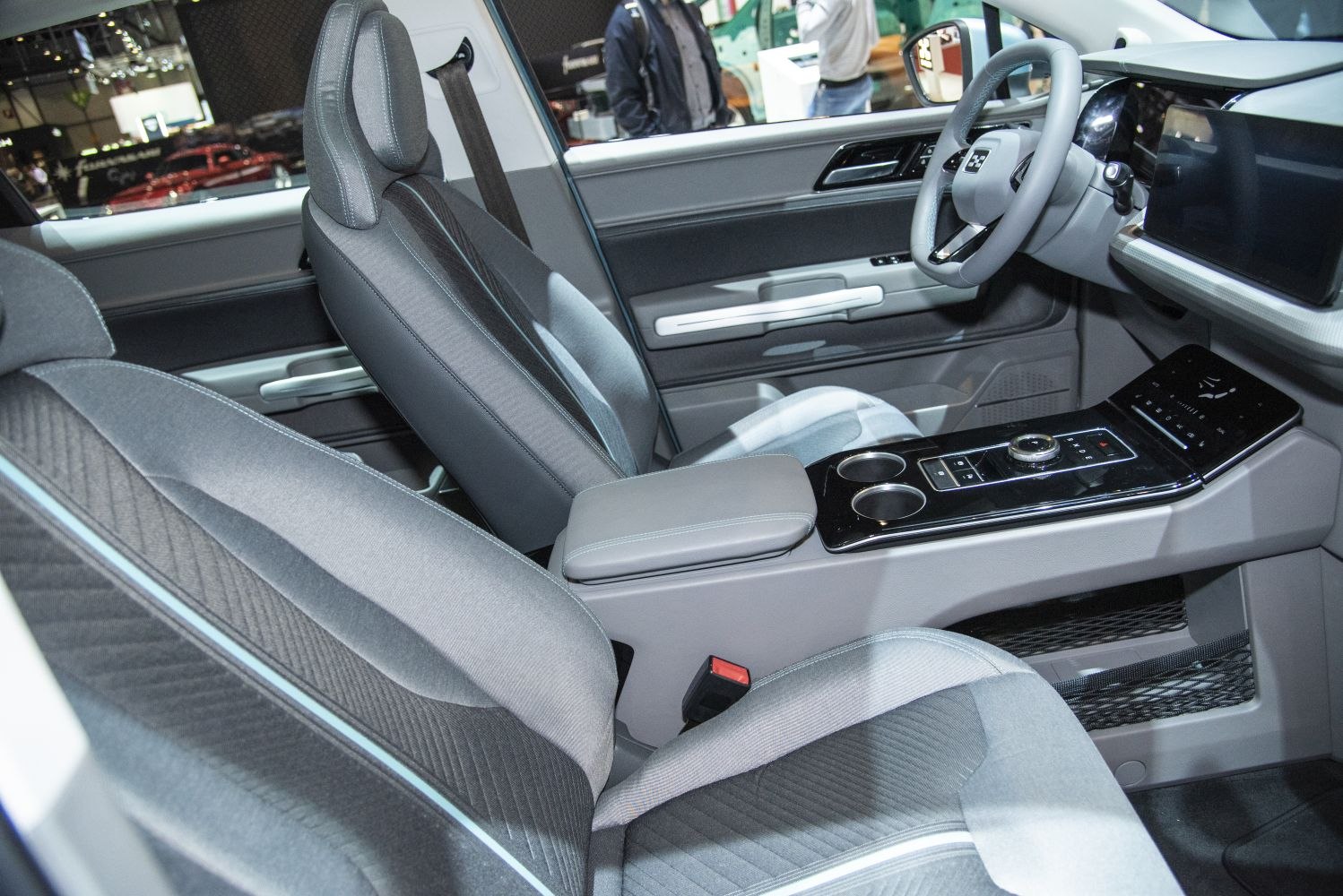 Modern car interior with ergonomic seats and digital central console