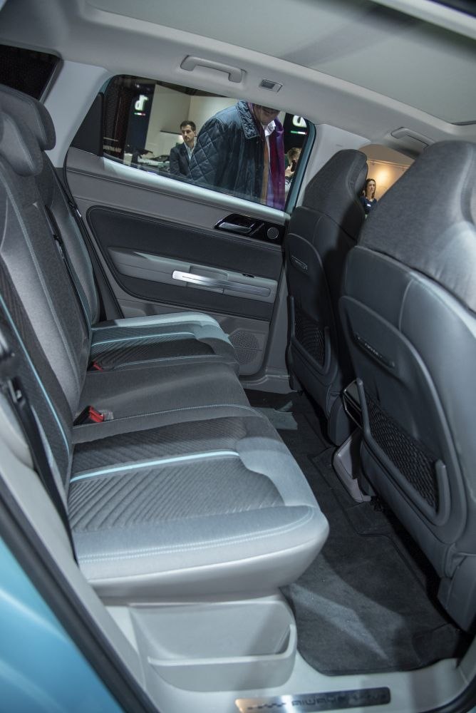 Rear seating area with spacious, modern design and fabric upholstery