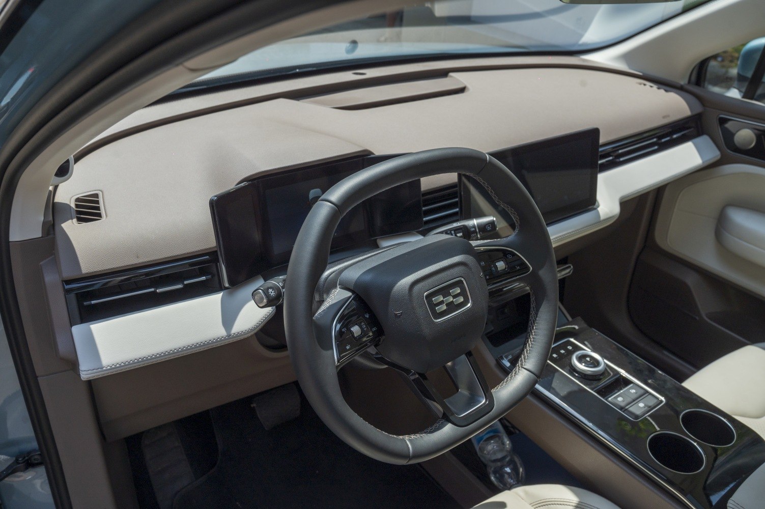 Digital instrument cluster and multifunction steering wheel in modern car interior