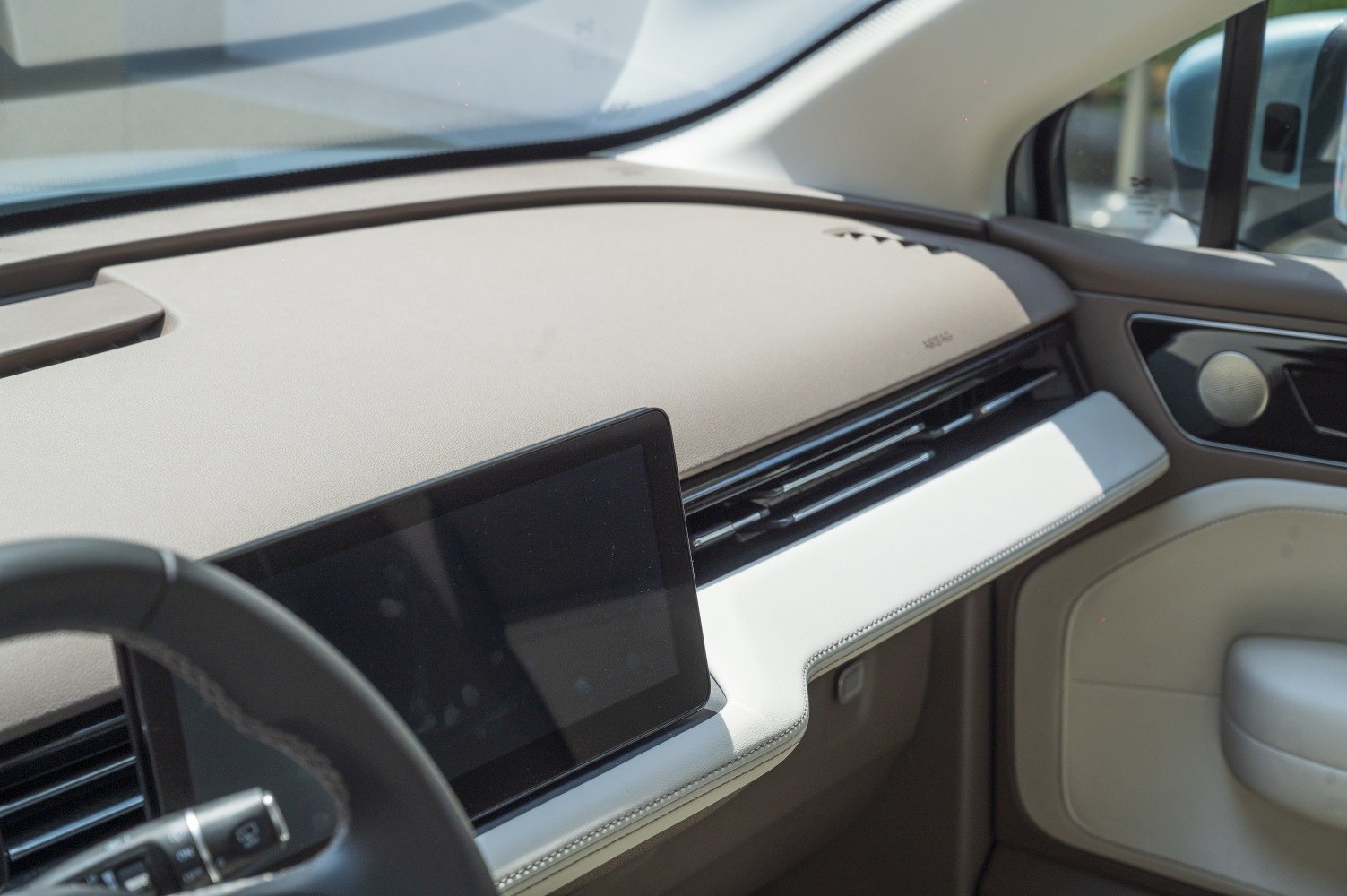 Modern dashboard with touchscreen and integrated air vents