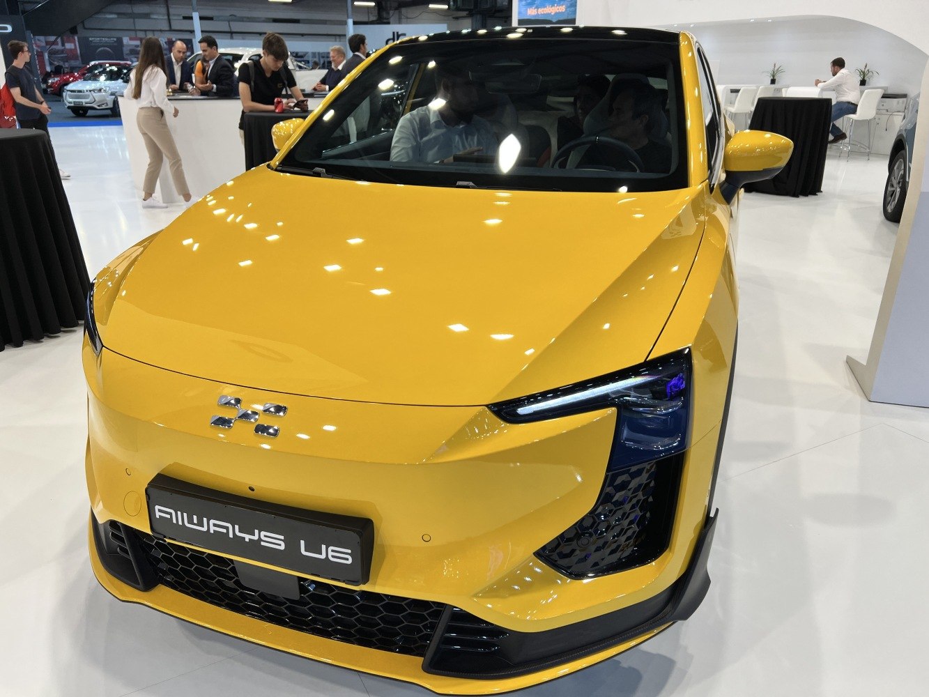 Front view with LED headlights and bold grille in yellow