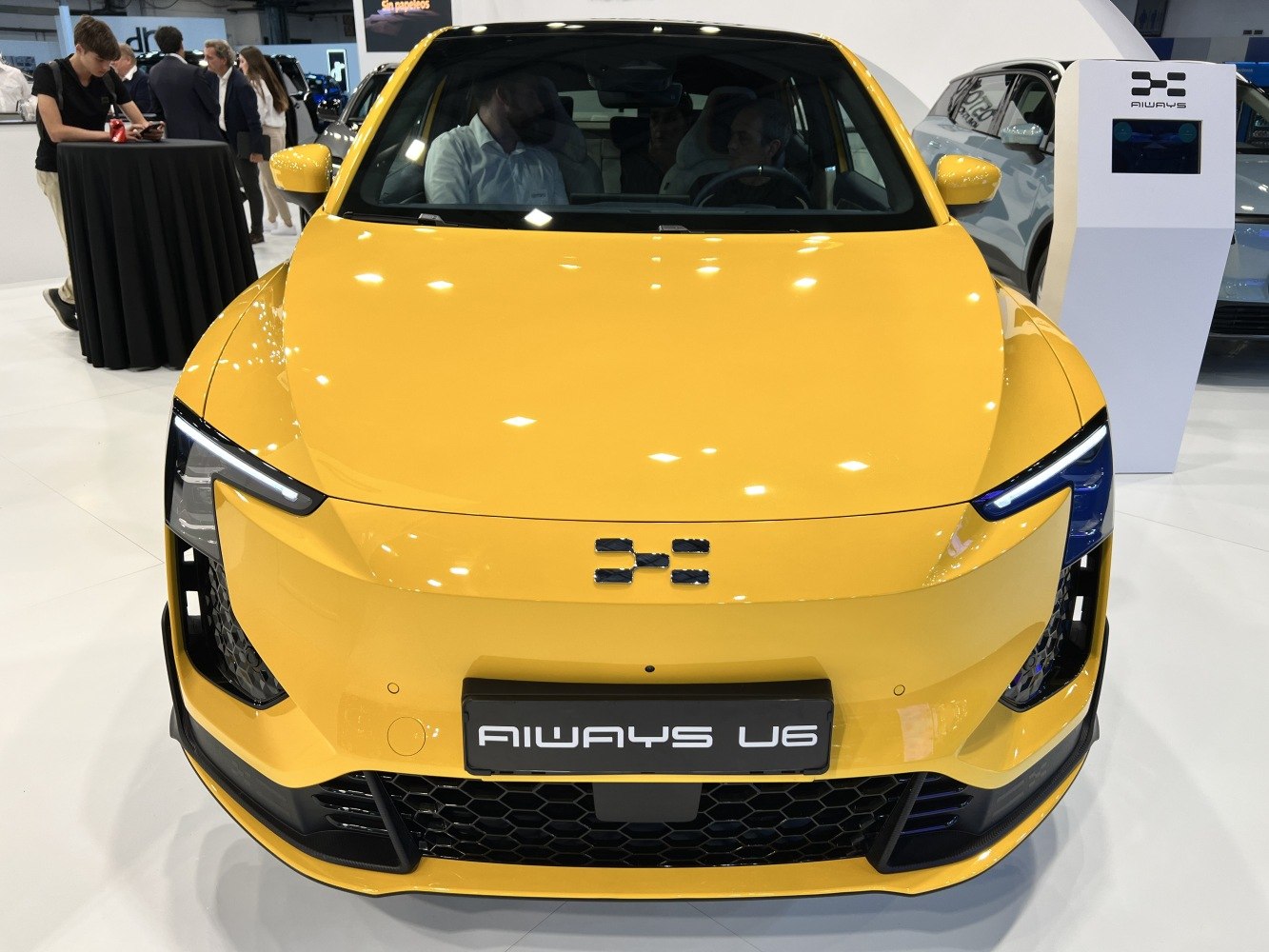 Sharp LED headlights and bold, aerodynamic front design in yellow.