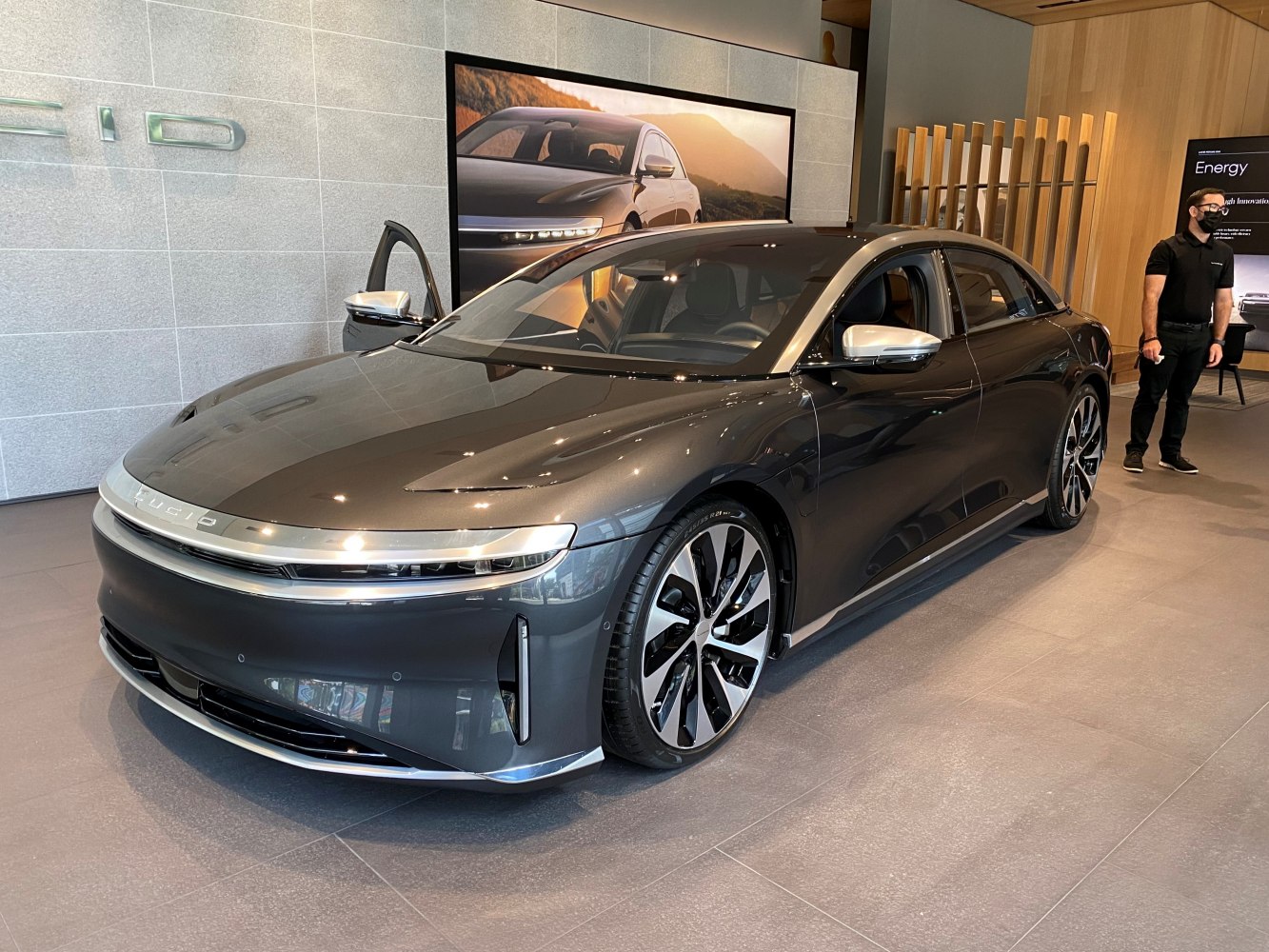Modern electric sedan with narrow headlights and aerodynamic body