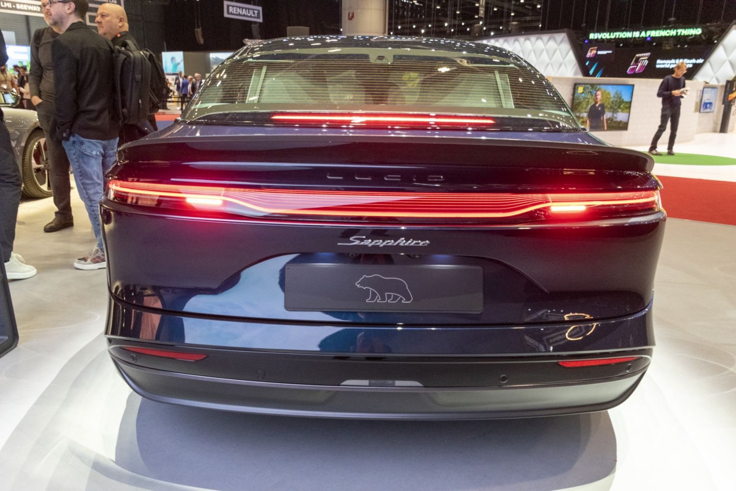 Sleek rear end with continuous LED tail light bar and integrated spoiler