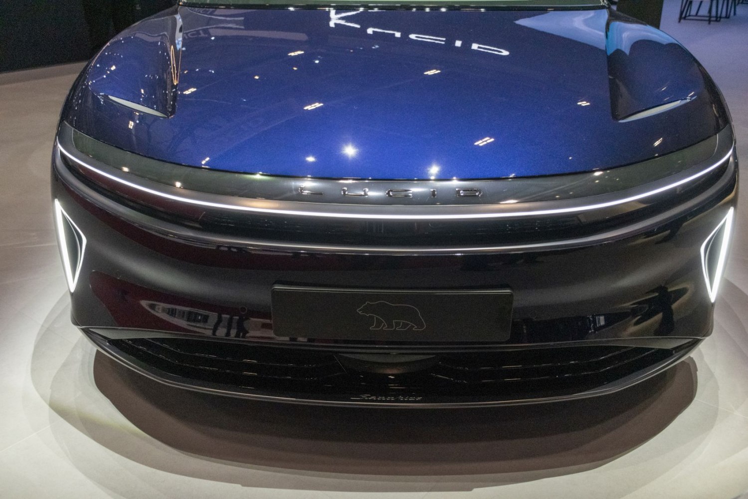 Illuminated front grille and LED headlights with sleek aerodynamic hood