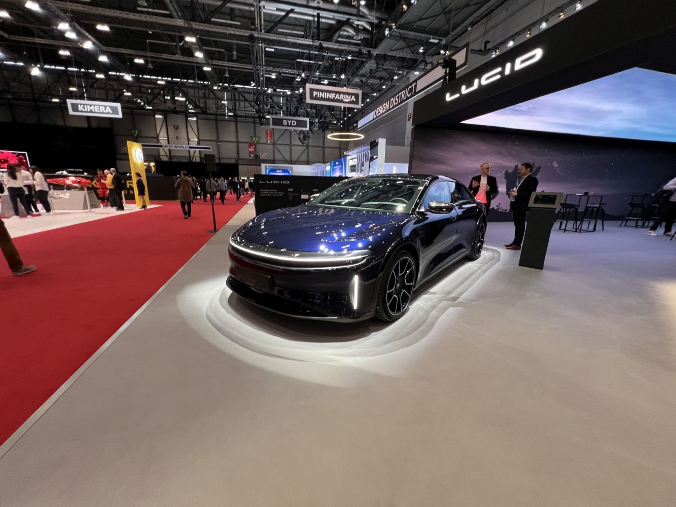 Electric sedan with distinctive LED front lighting and aerodynamic shape