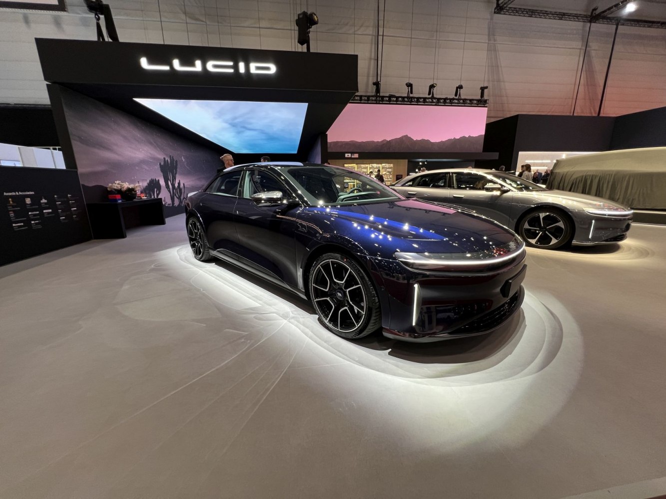 Sleek electric sedan with futuristic LED lighting and aerodynamic alloy wheels