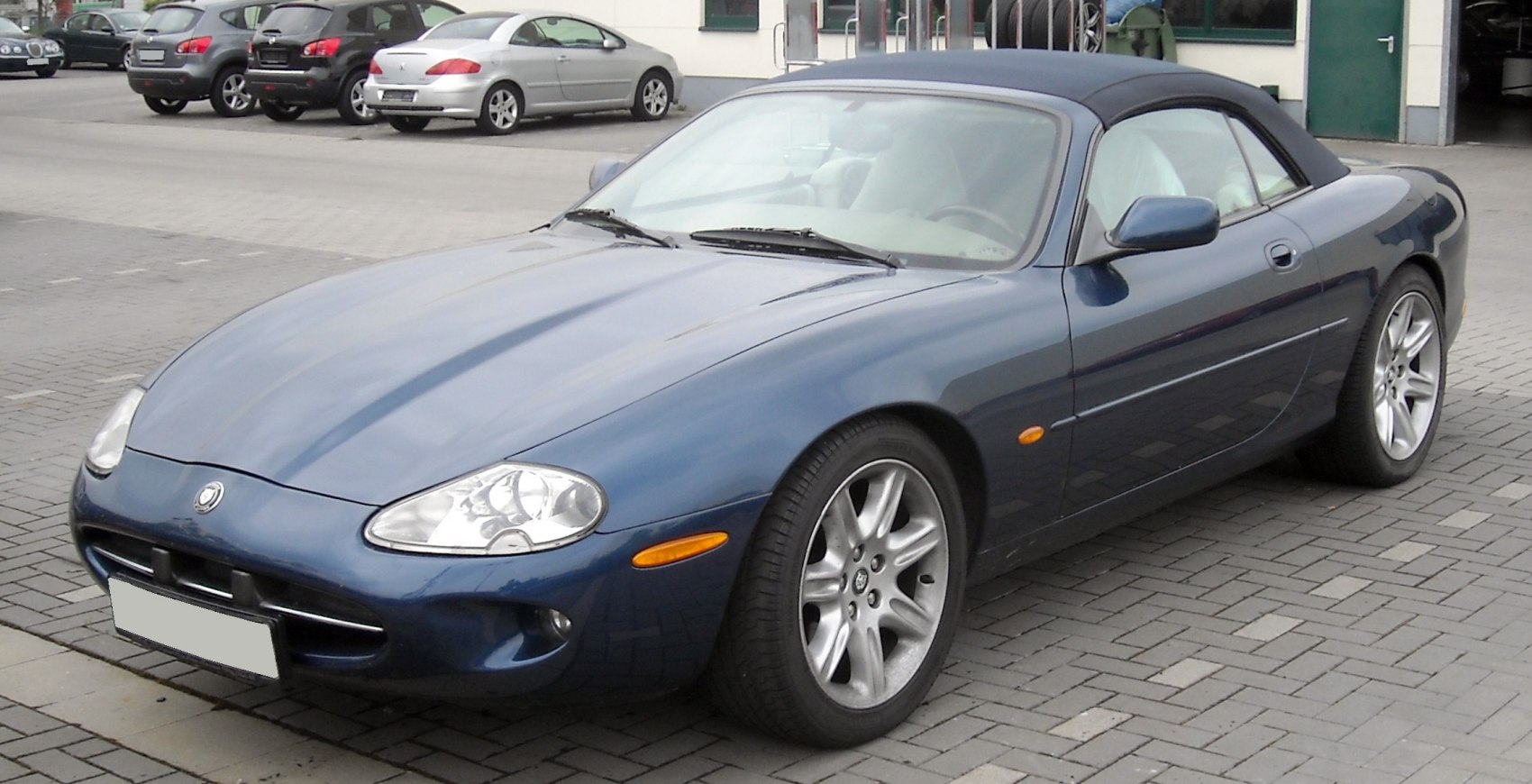 Convertible roadster with soft top and alloy wheels