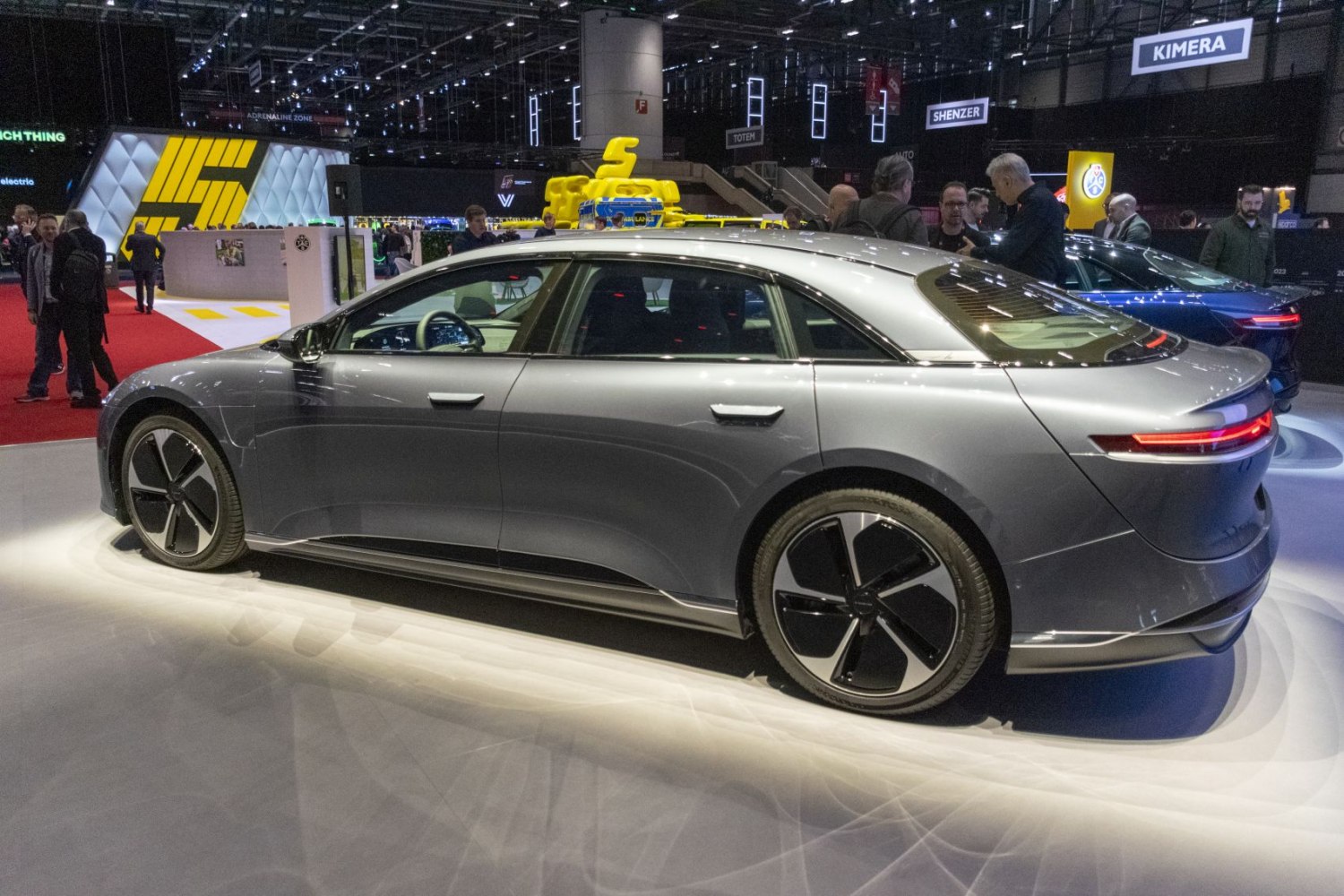Electric sedan with aerodynamic styling and LED taillights on modern alloy wheels
