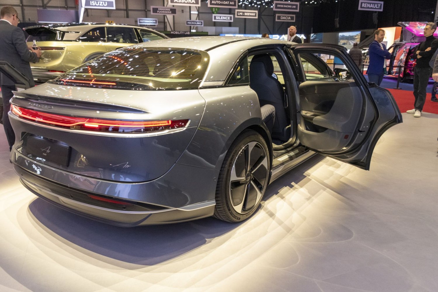 Rear view with open rear door and distinctive modern taillights