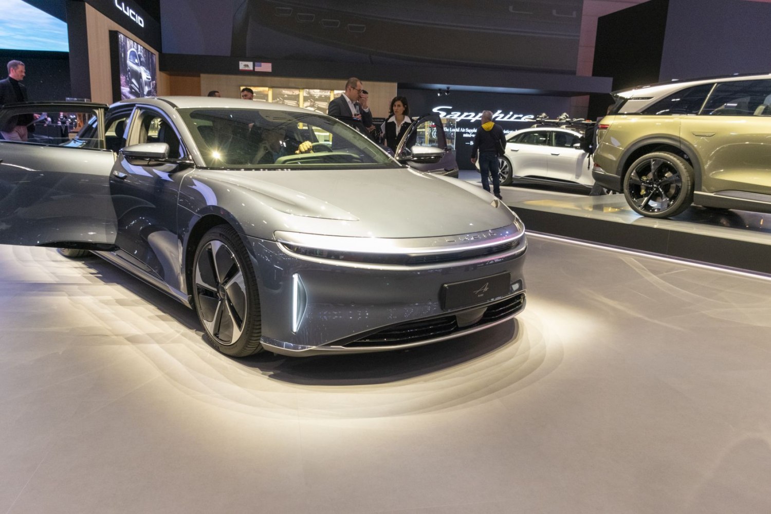 Front view of sleek electric sedan with LED headlights and aerodynamic design