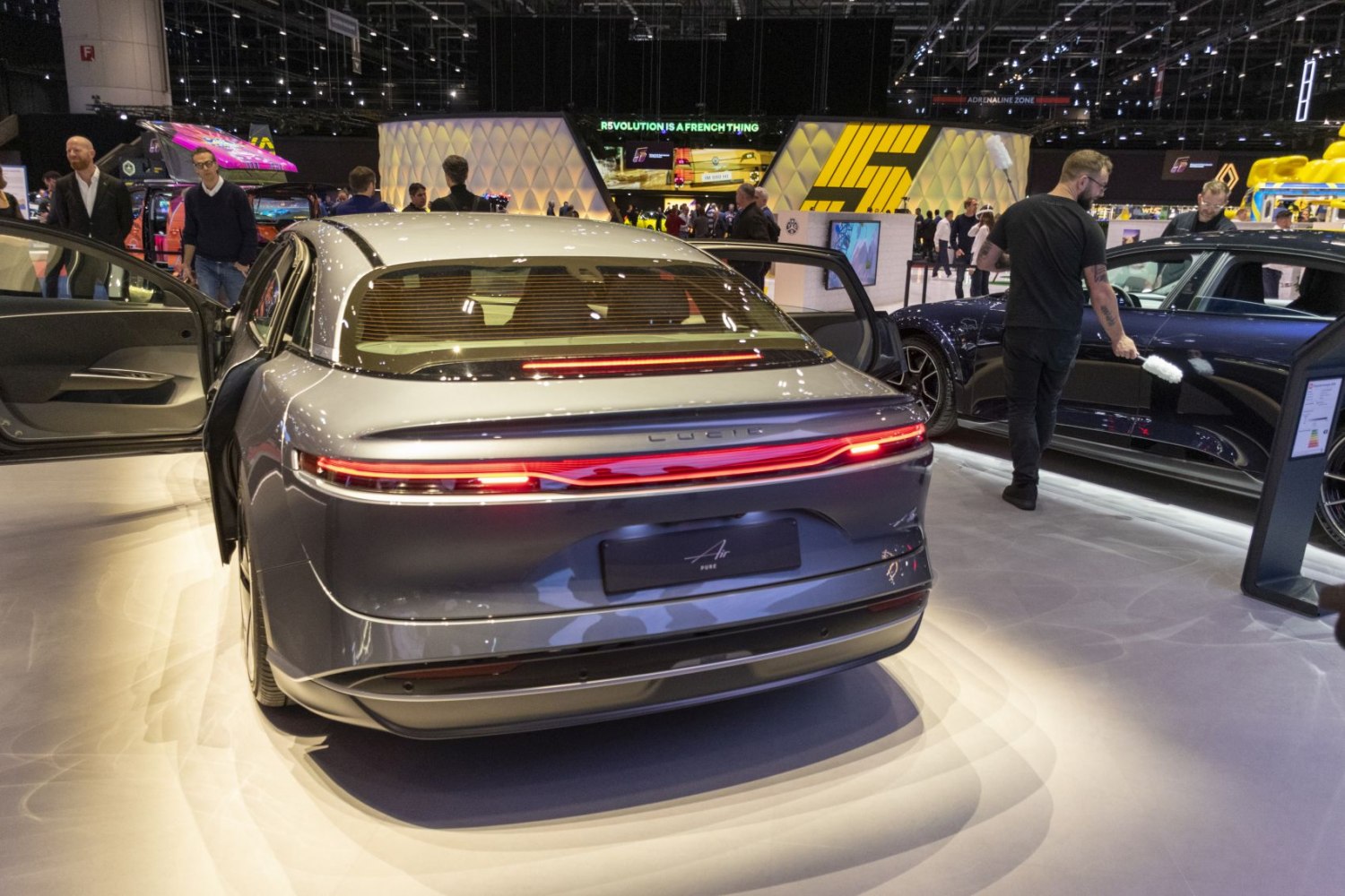 Rear view of electric sedan with LED tail light strip