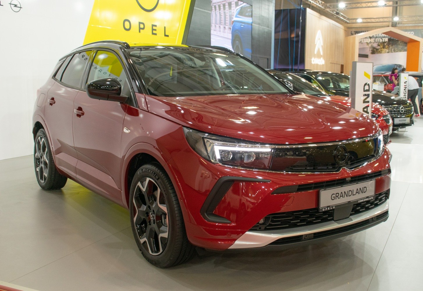 Front view of crossover with LED headlights and alloy wheels