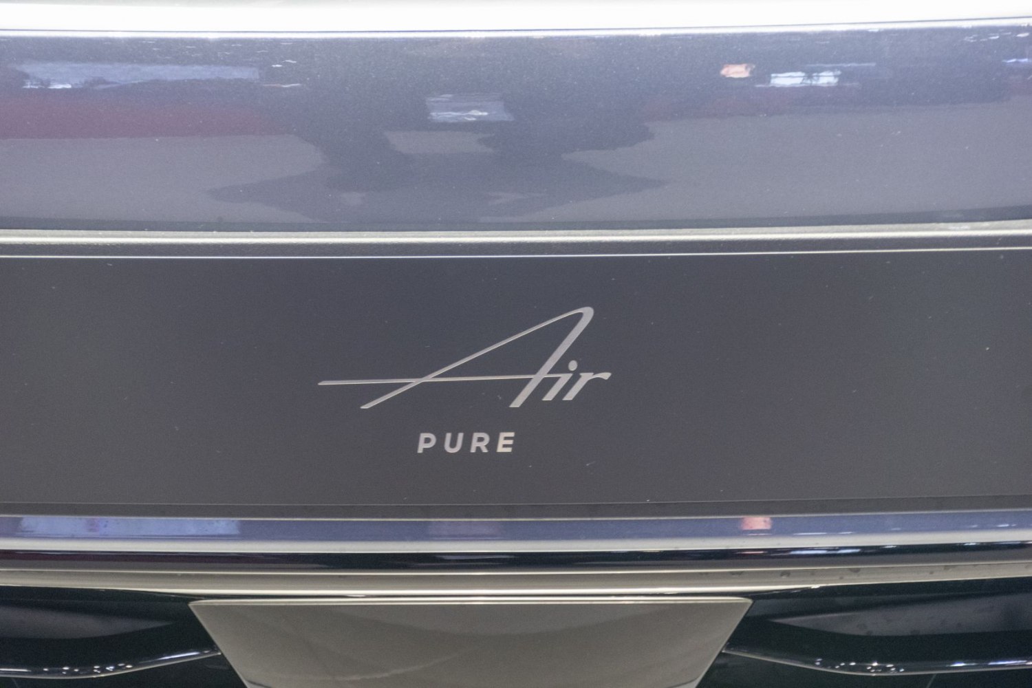 Lucid Air Pure rear badge and emblem close-up
