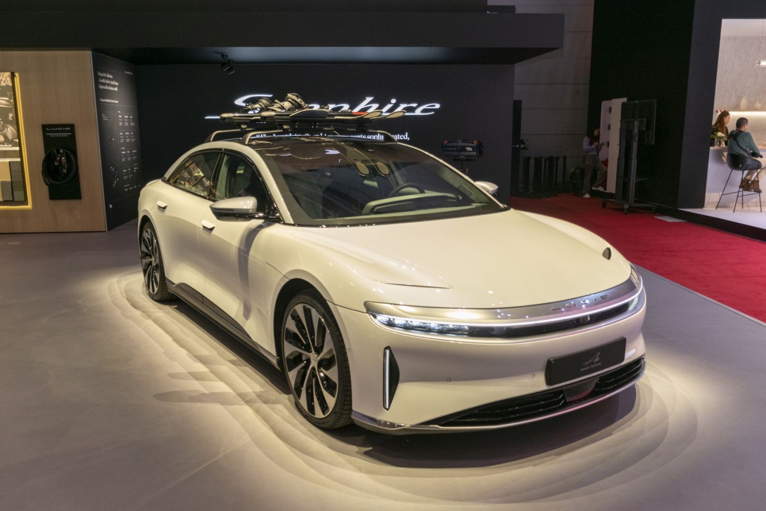 Sleek sedan with roof ski rack and modern LED lights