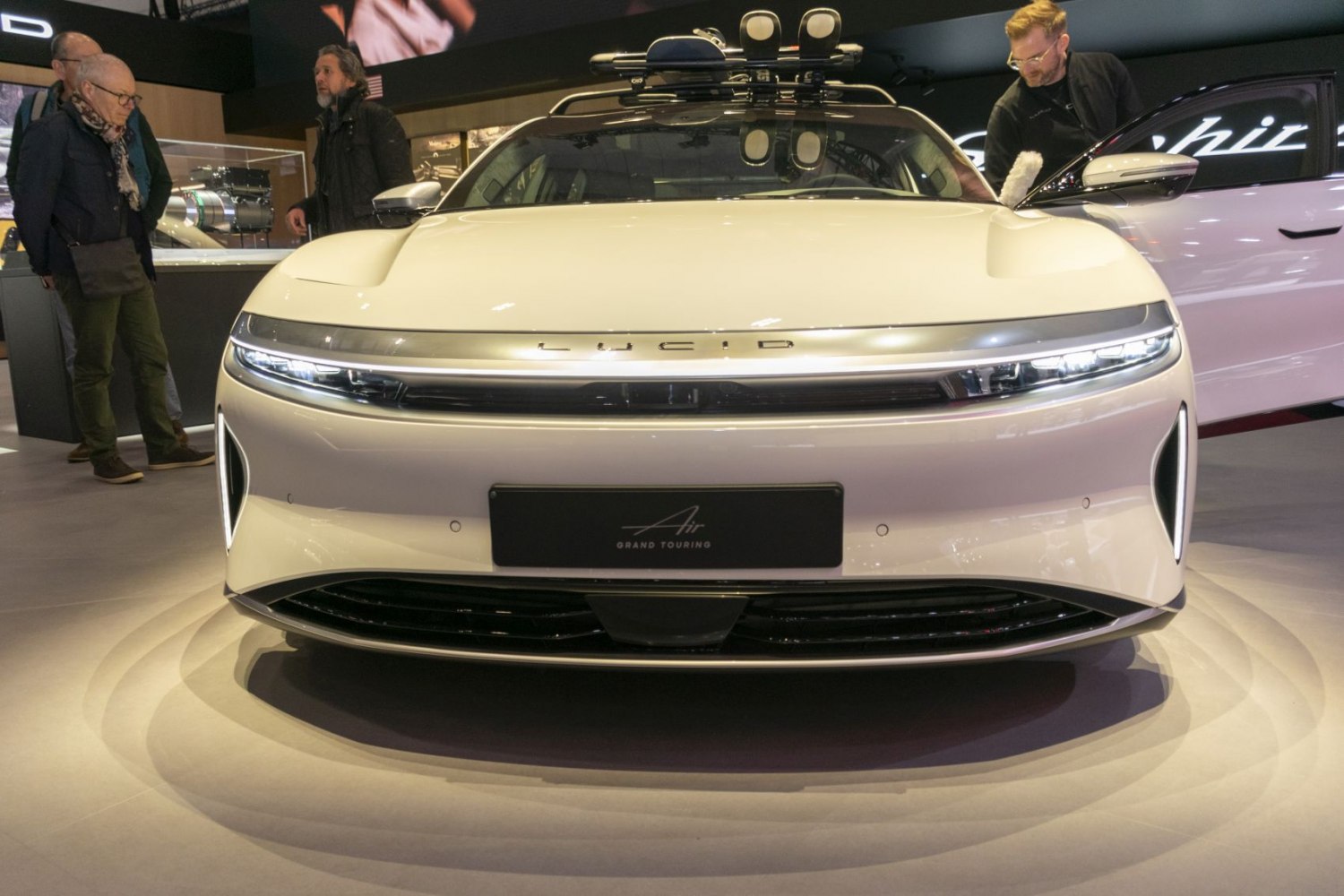 Sleek front with LED headlights and aerodynamic design.