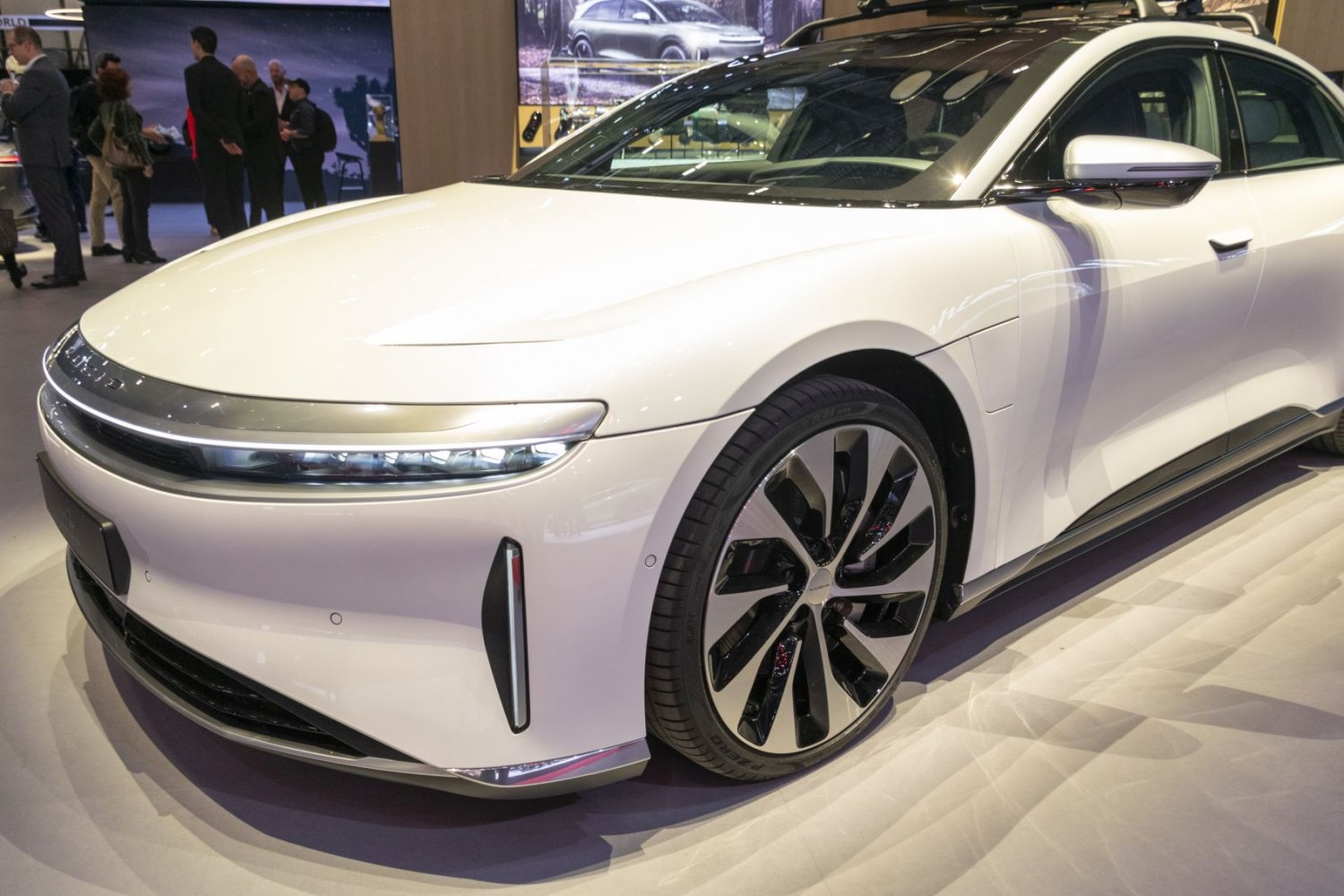 Sleek front end with integrated headlights and large aerodynamic alloy wheels