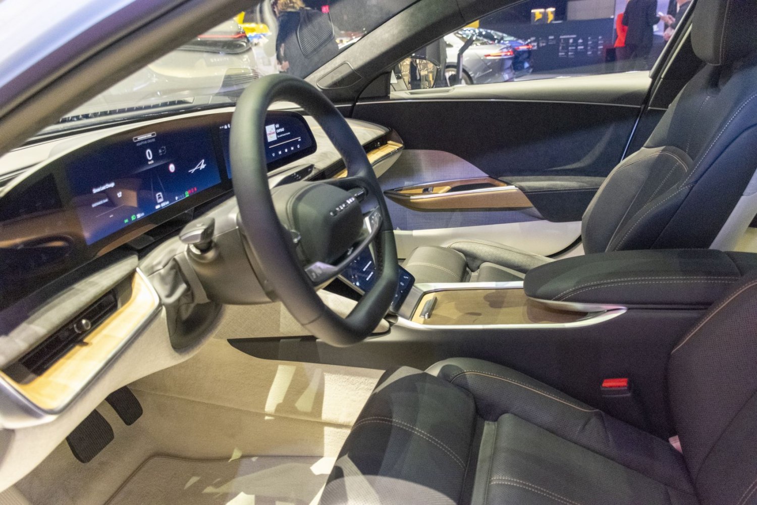Digital dashboard and modern steering wheel in luxury car interior