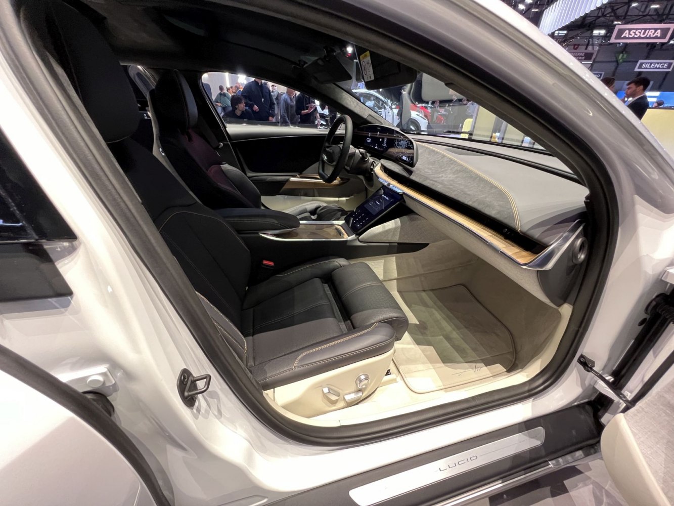 Modern dashboard and black leather seats in a luxury vehicle interior