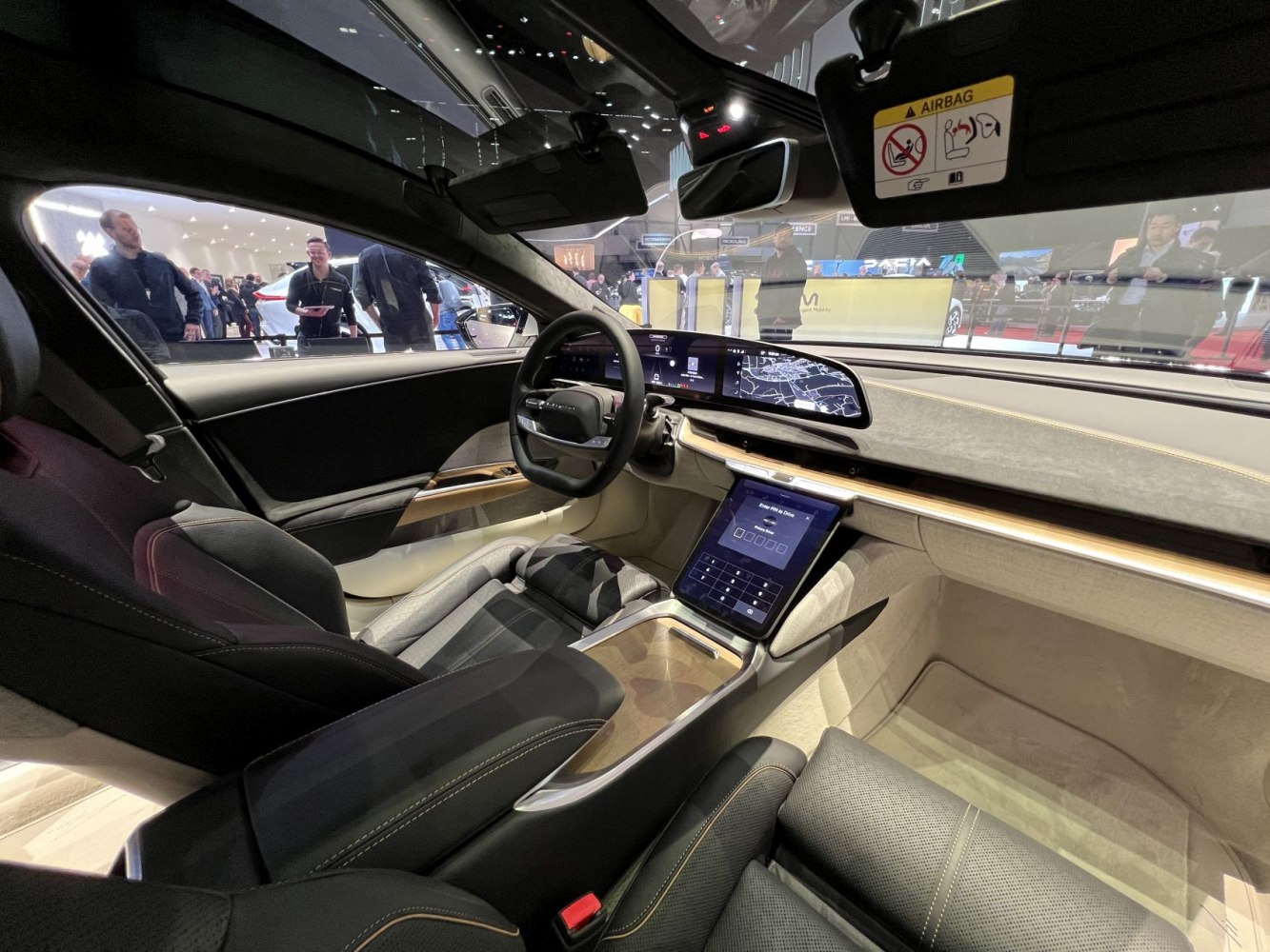 Dual widescreen digital displays and luxury interior with wood trim