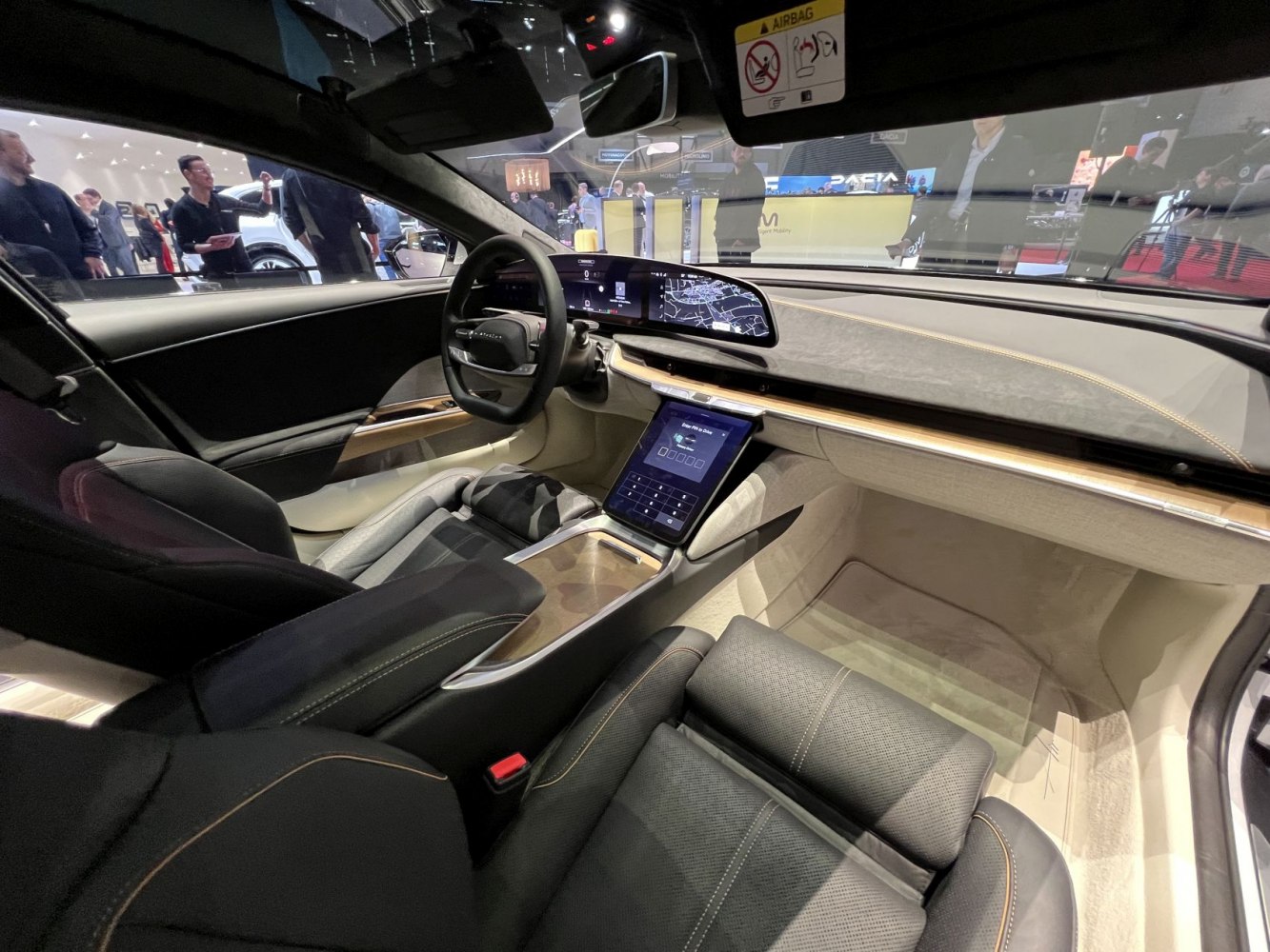 Digital dashboard and central touchscreen console in luxury electric car interior