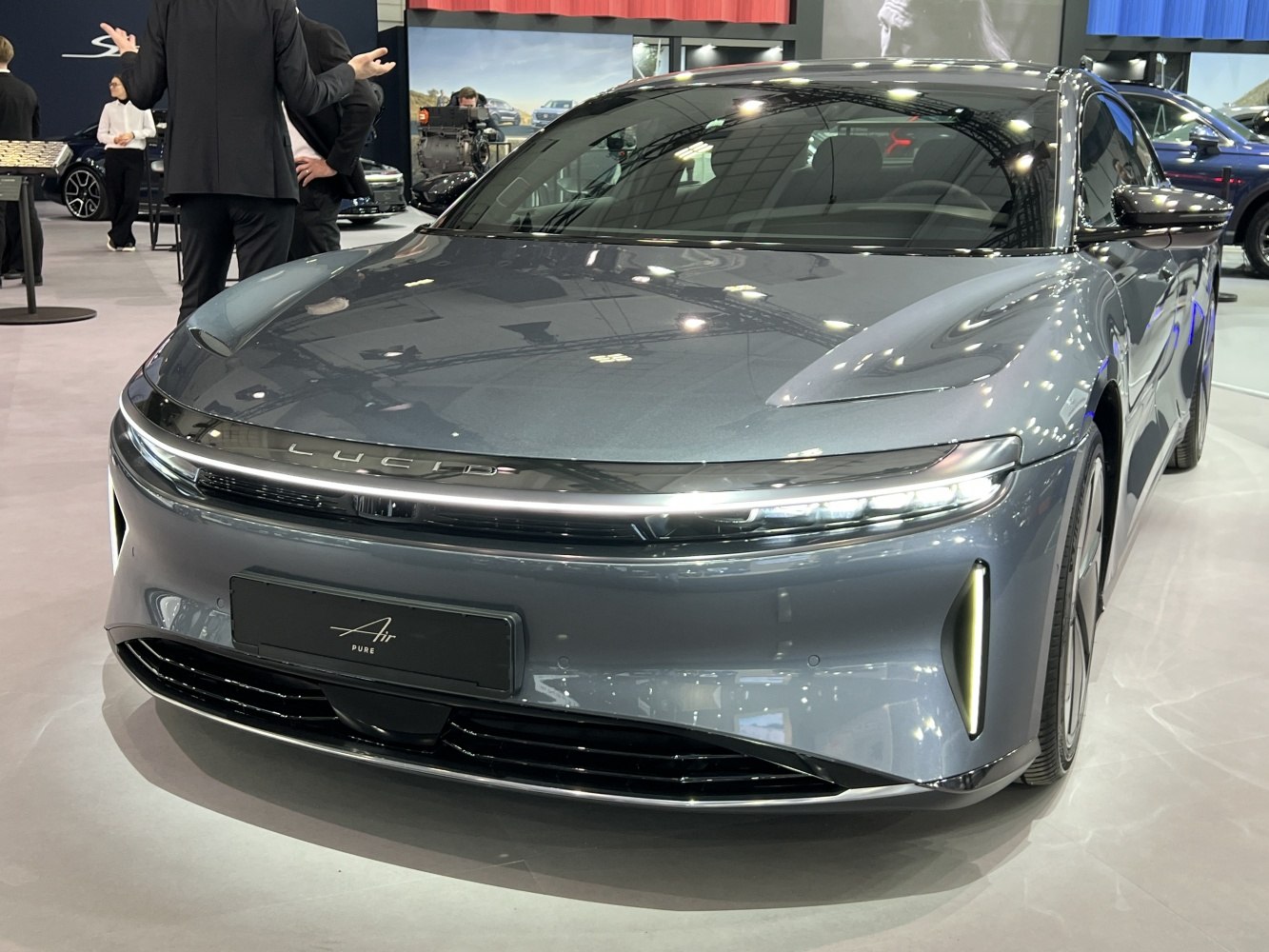 Sleek front view with LED headlights and aerodynamic hood