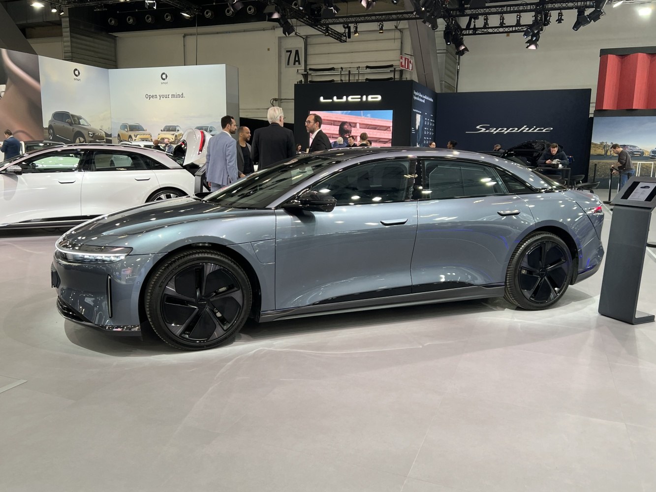 Sleek electric sedan with aerodynamic profile and black alloy wheels