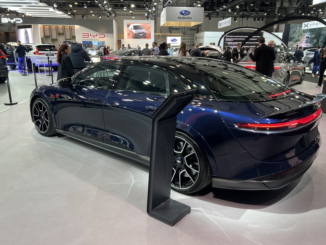 Sleek rear side view with continuous LED taillights and aerodynamic design