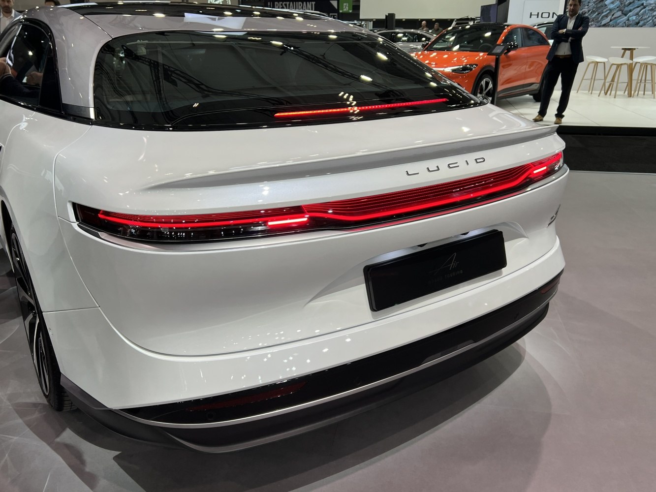Illuminated rear light bar and sleek aerodynamic rear design