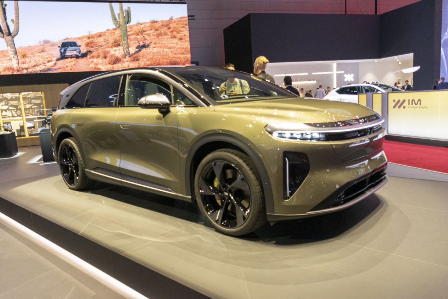 Streamlined electric SUV with LED light bar and aerodynamic design
