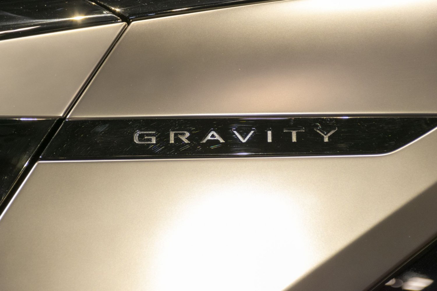 Close-up of vehicle model emblem on body panel