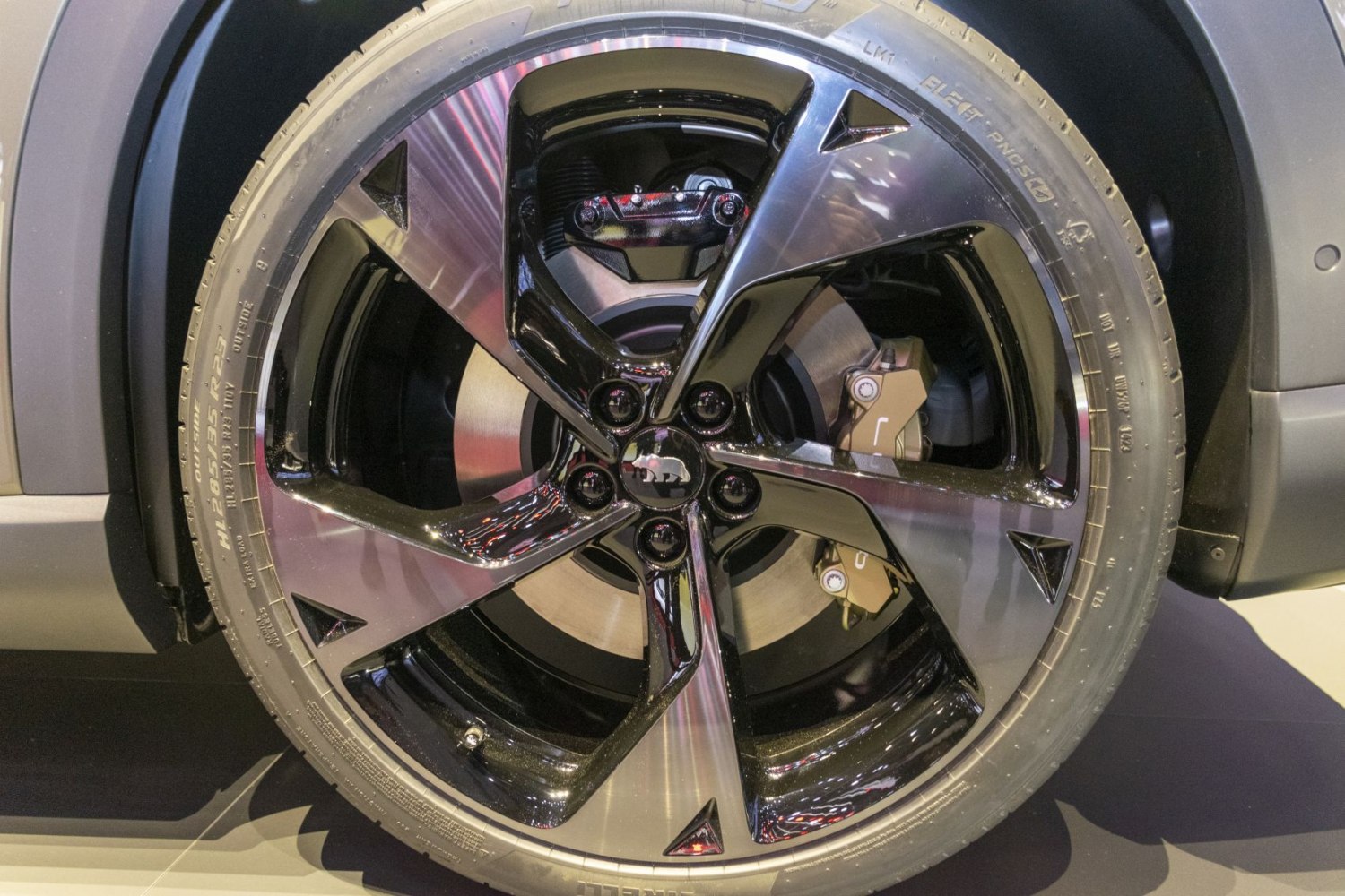 Close-up of an alloy rim and brake caliper design