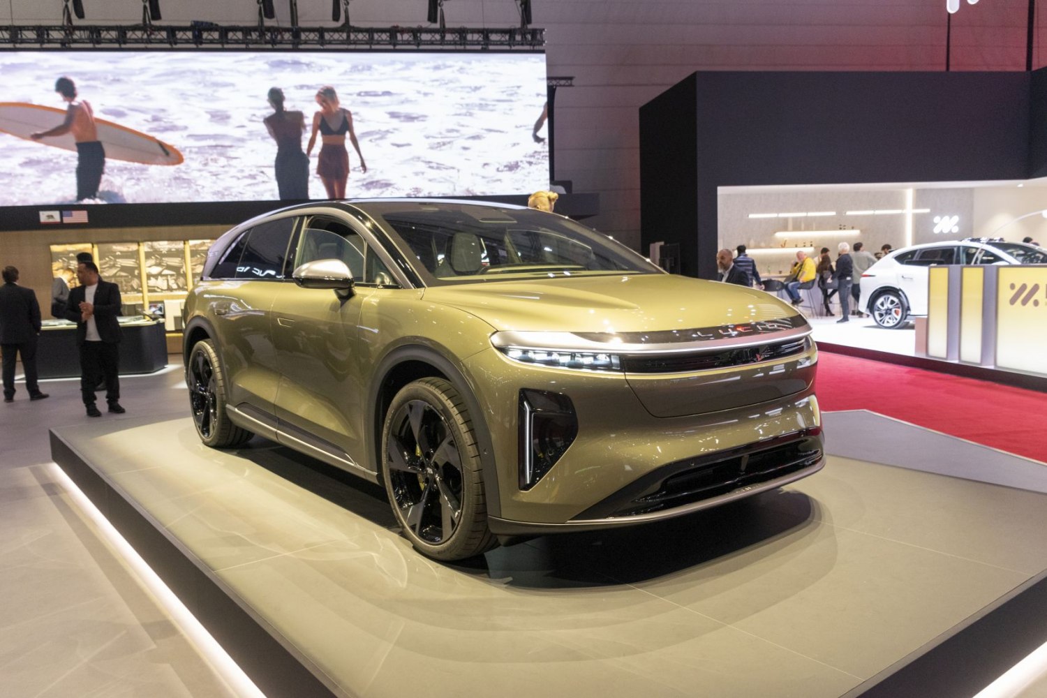 Front view with LED headlights and black alloy wheels on luxury electric SUV