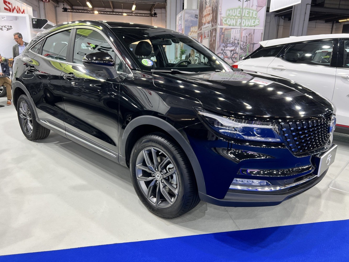Sleek SUV front side with LED headlights and alloy wheels