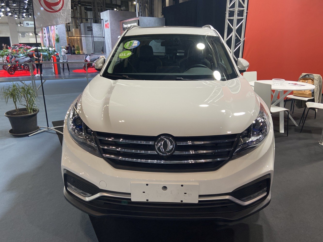 White SUV front with chrome grille and LED headlights